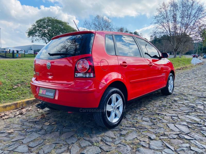 VOLKSWAGEN - POLO - 2011/2012 - Vermelha - R$ 44.900,00