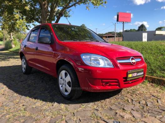 CHEVROLET - PRISMA - 2009/2009 - Vermelha - R$ 27.900,00